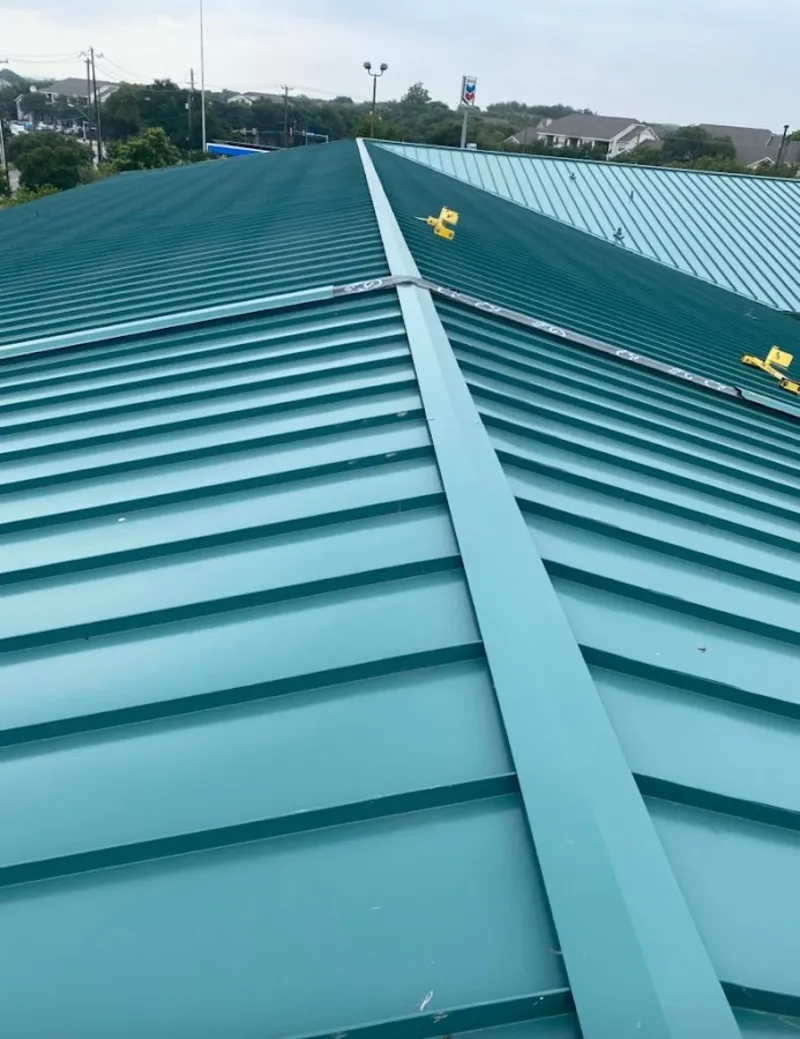 Green commercial metal roof ridge and valley for Metal Roof Repair in Niagara
